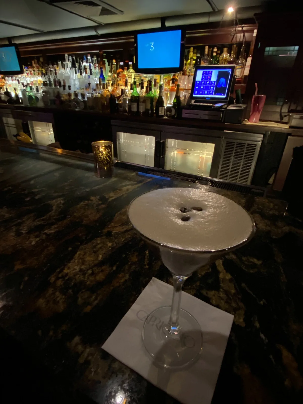 An espresso martini on the granite bar at Capriccio in Providence
