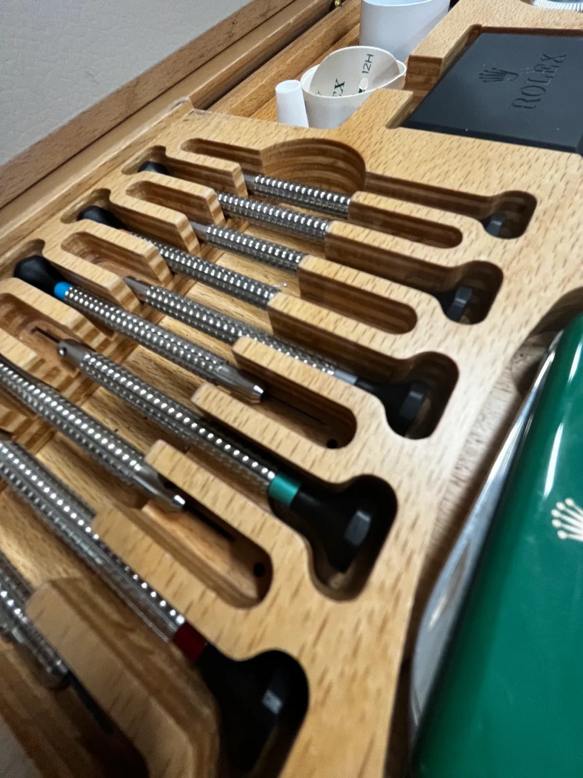 A set of watchmaker's screwdrivers in a fitted wooden case